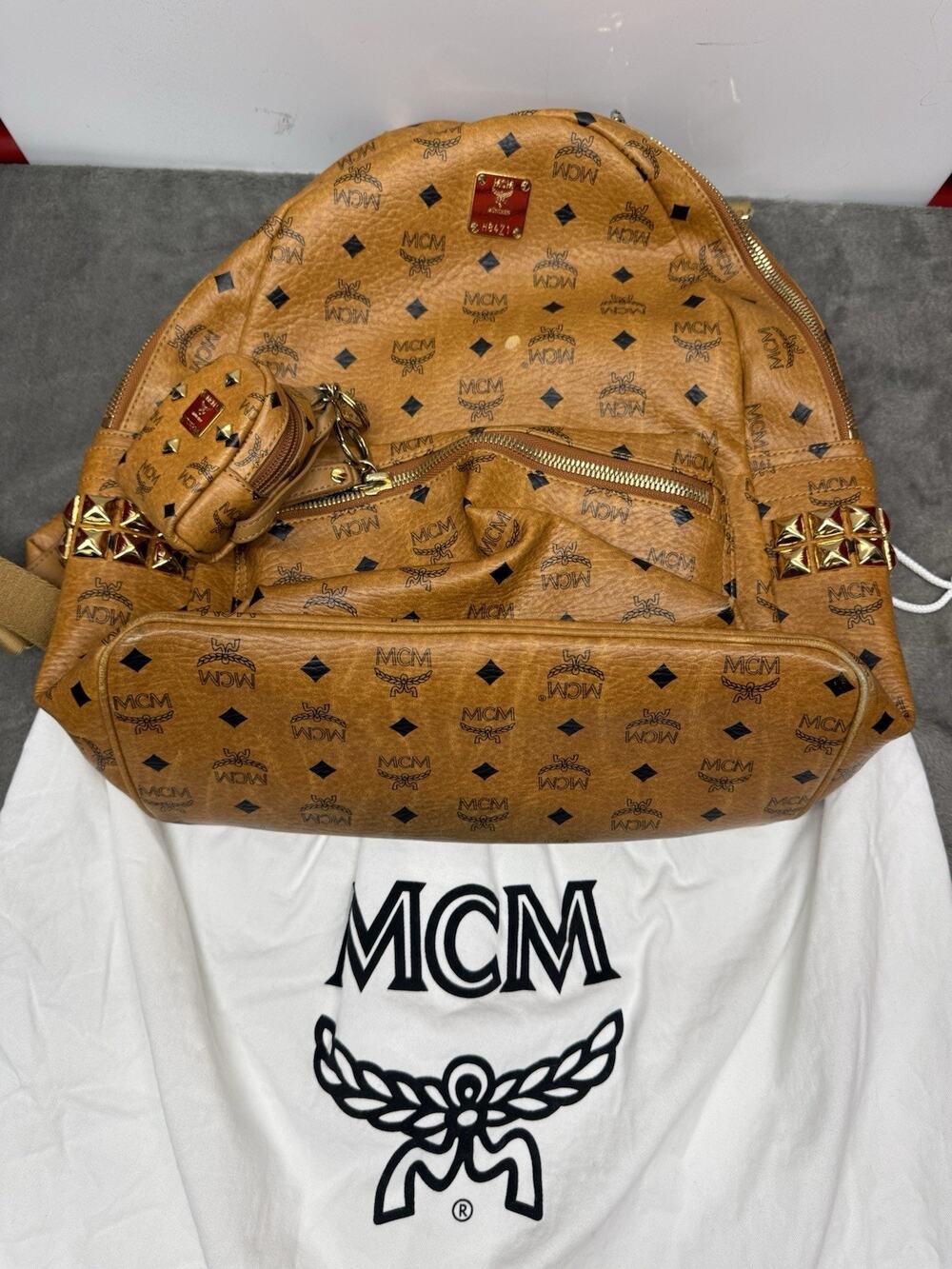 MCM Stark Side Studs Medium Cognac Visetos Backpack Pouch Dust Bag